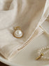 elegant golden single pearl charm