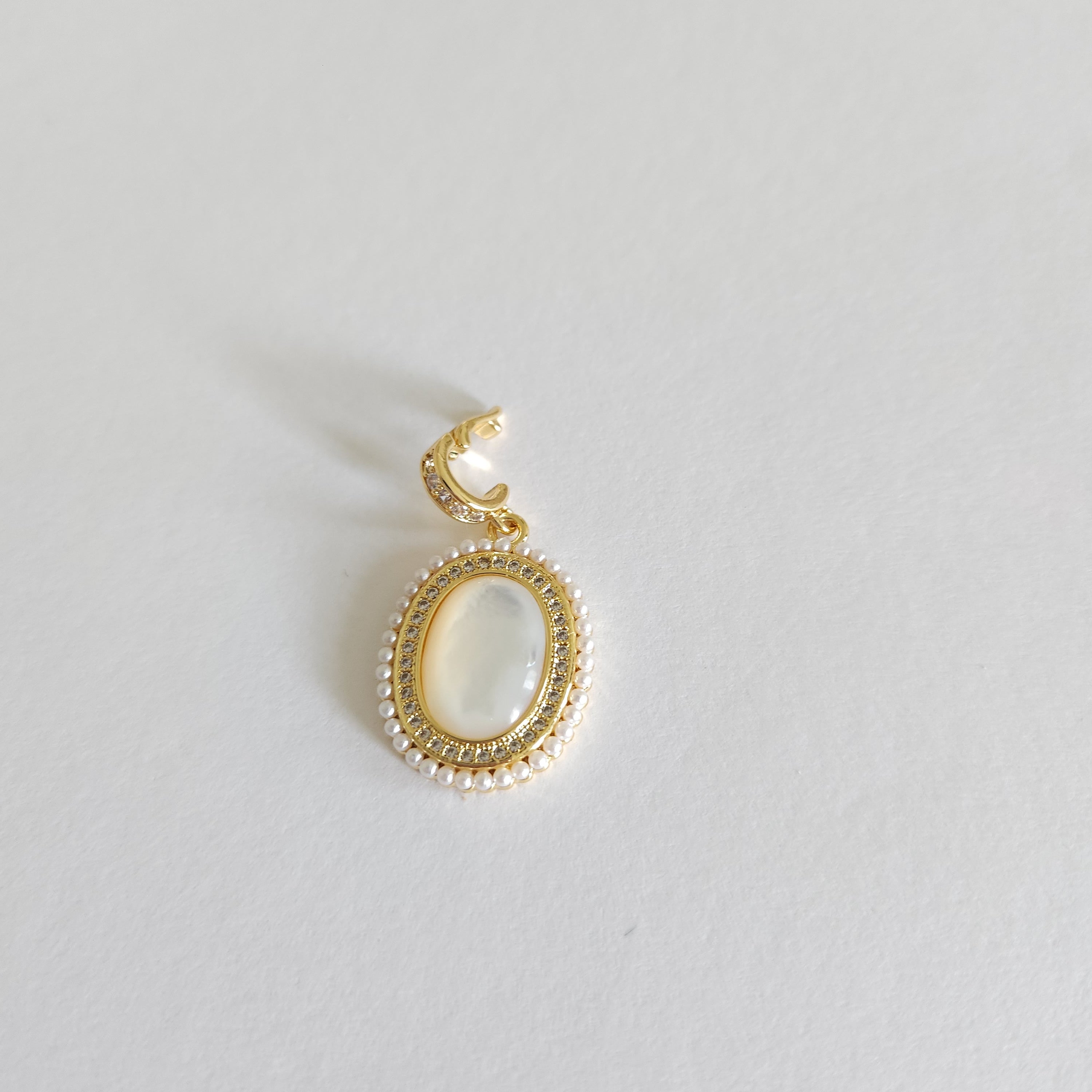 oval shell pearl charm