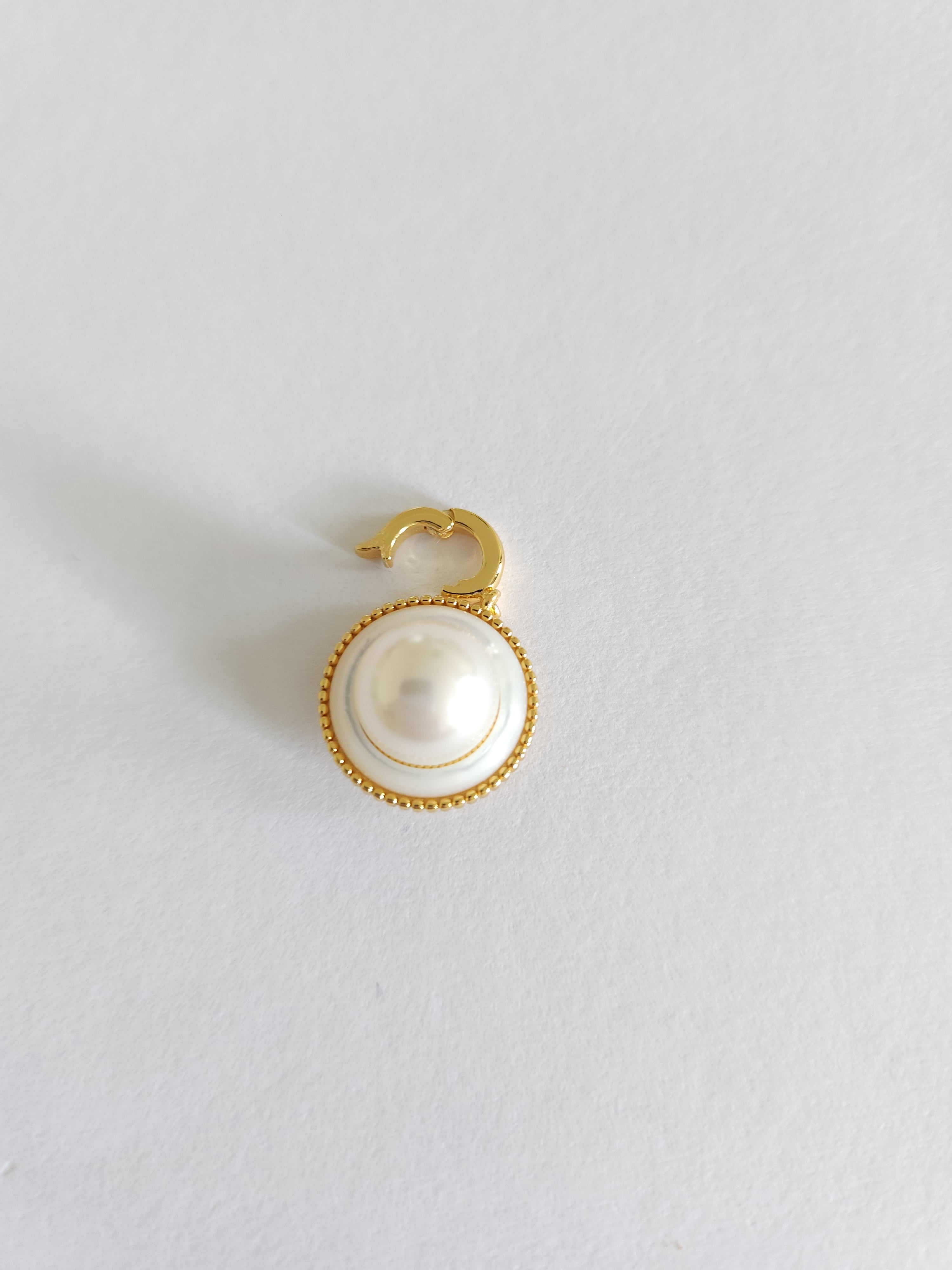 elegant golden single pearl charm