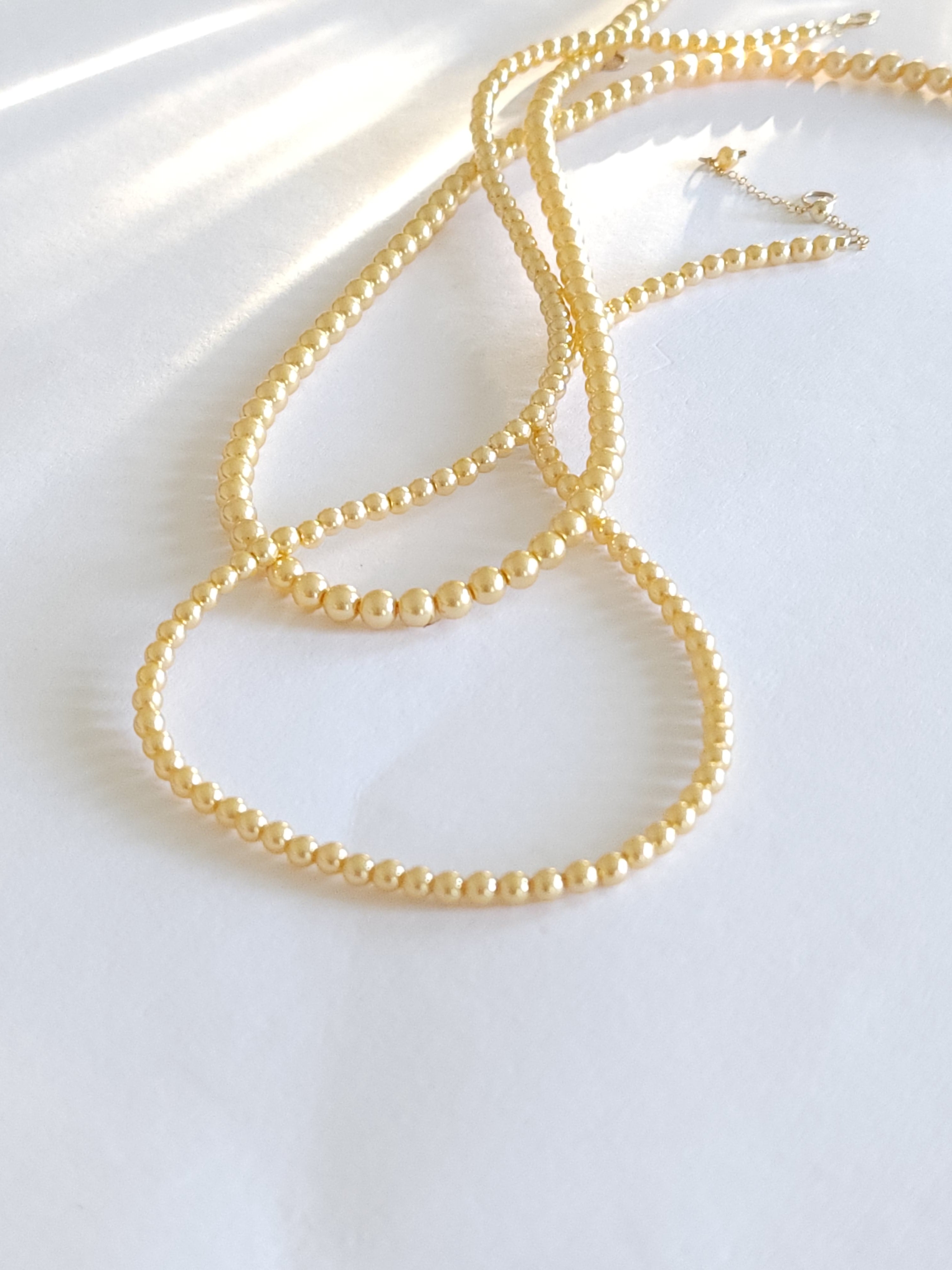 Golden crystal pearl necklace